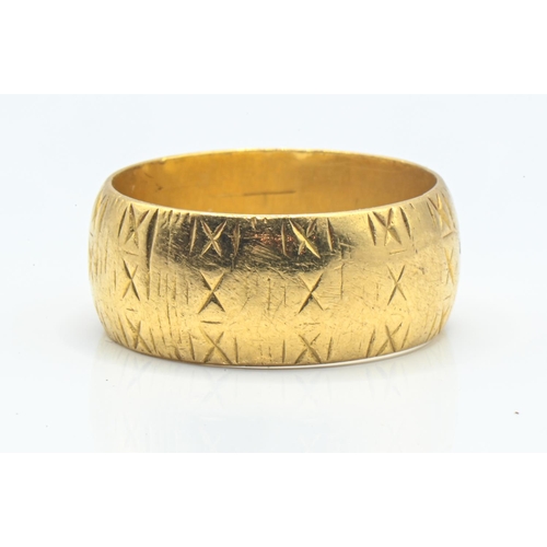 67 - 22ct gold band ring, continuously decorated with an X motif, hallmarked London 1969, size N, 8.5 gra... 