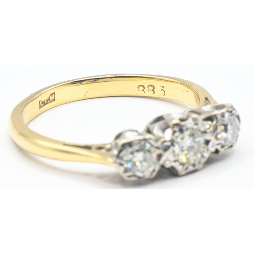 77 - Yellow metal mounted three diamond ring, the diamonds together weighing approximately 0.44 carat, ye... 