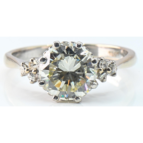 78 - 18ct gold and diamond ring, centring a brilliant-cut diamond weighing approximately 2.50 carats flan... 