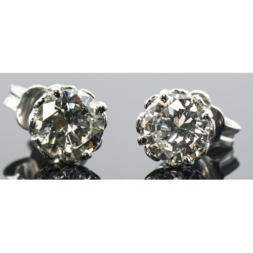 80 - Pair of diamond ear studs, the brilliant-cut diamonds together weighing approximately 1.5 carats, ea... 