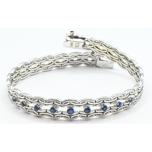 81 - 14ct white gold and sapphire bracelet, stamped 585, length 190mm, gross weight 18.83 grams