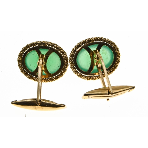 90 - Pair of 18ct gold and green stone cufflinks, each centring a collet-set cabochon green stone framed ... 