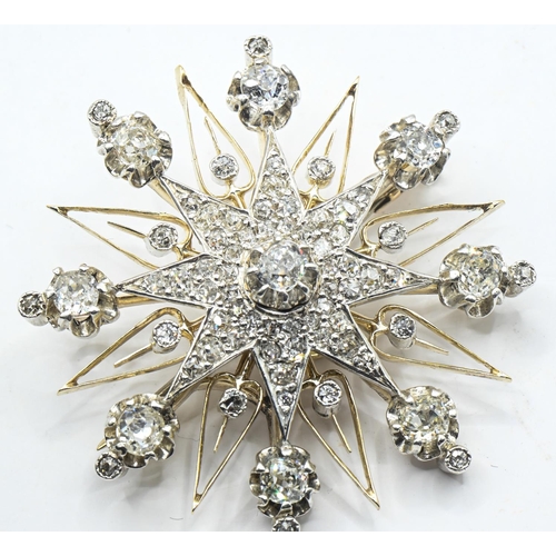 99 - Antique yellow metal diamond star pendant/brooch, width 40mm, gross weight 15.66 grams