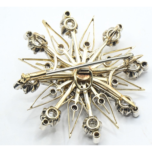 99 - Antique yellow metal diamond star pendant/brooch, width 40mm, gross weight 15.66 grams