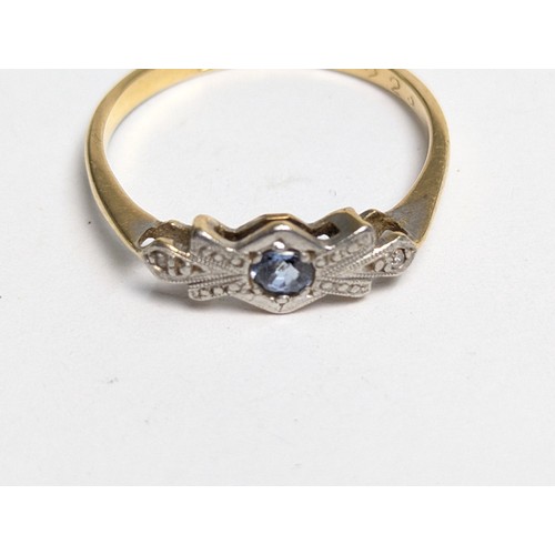 108 - 18ct gold, platinum, blue topaz and diamond ring, marked 18CT & PLAT, size P, gross weight 2.37 ... 