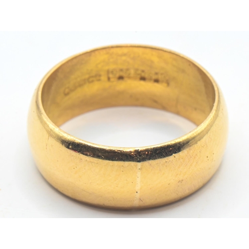 109 - 22ct gold band ring, Birmingham hallmarks, size K1/2, 7.44 grams