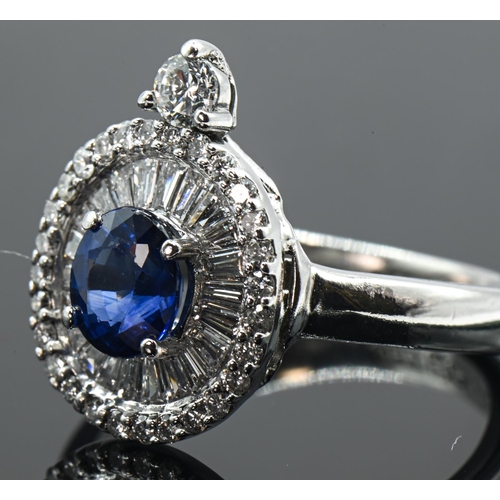 117 - 18ct white gold, sapphire and diamond cluster ring with an  additional diamond set to one end, ... 