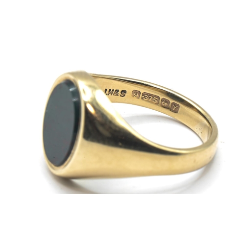 126 - 9ct gold and bloodstone signet ring, hallmarked Birmingham 1973, size J, gross weight 3.57 grams... 