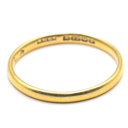 129 - 22ct gold band ring, hallmarked Birmingham 1939, size L1/2, 1.56 grams