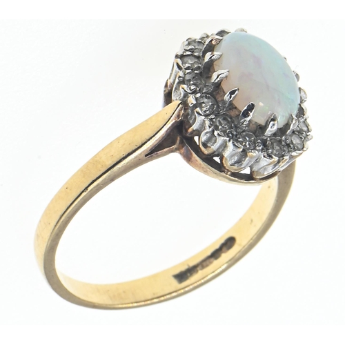 134 - 9ct gold, opal and diamond cluster ring, Birmingham hallmarks, size M1/2, 2.85 grams