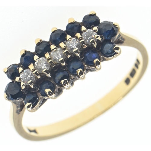 136 - 9ct gold, blue and white stone ring, blue stones testing as spinel, hallmarked London 1982, size N1/... 