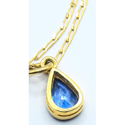 146 - 18ct gold and teardrop-shaped sapphire pendant and 18ct gold chain, hallmarked, length 15mm and 445m... 