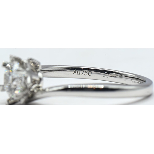 172 - 18ct white gold and synthetic moissanite solitaire ring, shank marked Au750 D1.00ct, size O, gross w... 