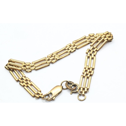 176 - 9k marked yellow metal gate link bracelet with one non gold extender link, length 200mm, gross weigh... 