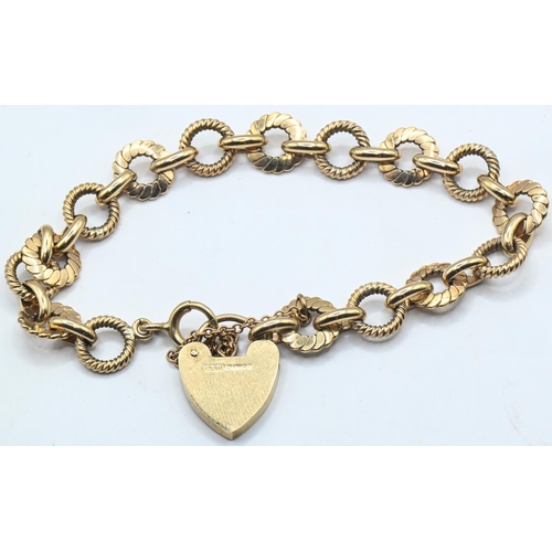 177 - 9ct gold fancy link bracelet with heart-shaped padlock clasp, bracelet and padlock hallmarked, with ... 