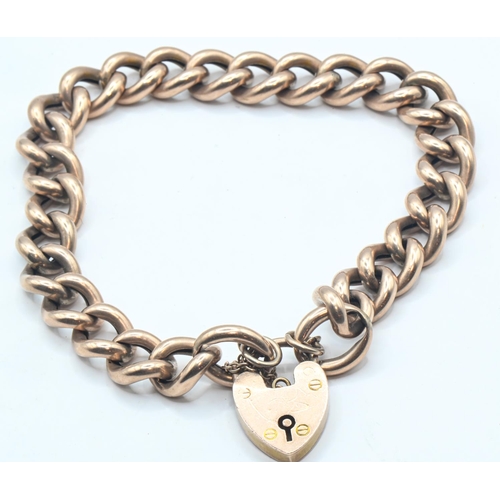 185 - 9ct rose gold curb link bracelet with heart-shaped padlock clasp, clasp stamped 9CT, 20.44 grams... 