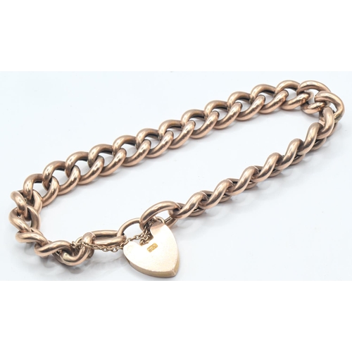 185 - 9ct rose gold curb link bracelet with heart-shaped padlock clasp, clasp stamped 9CT, 20.44 grams... 