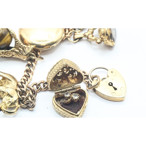 186 - 9ct gold charm bracelet, with six 9ct gold hallmarked charms including stone set, a 9ct gold front a... 