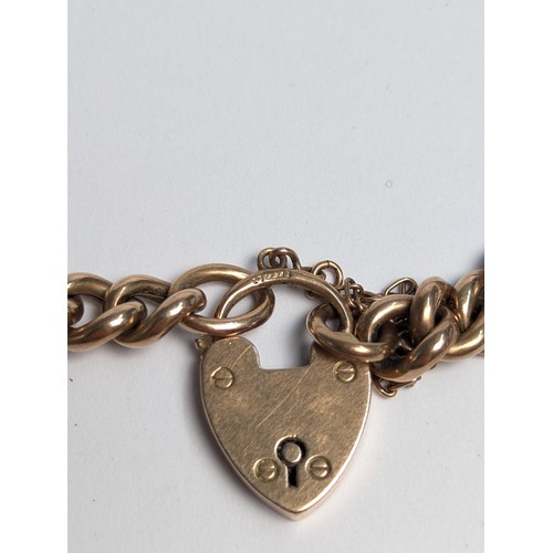 190 - 9ct rose gold curb link bracelet with heart-shaped padlock clasp, padlock hallmarked, with safety ch... 