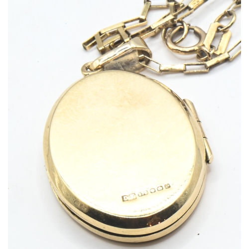 192 - 9ct gold oval locket and 9ct gold chain, locket engraved 'MA' to front, locket and chain hallmarked,... 