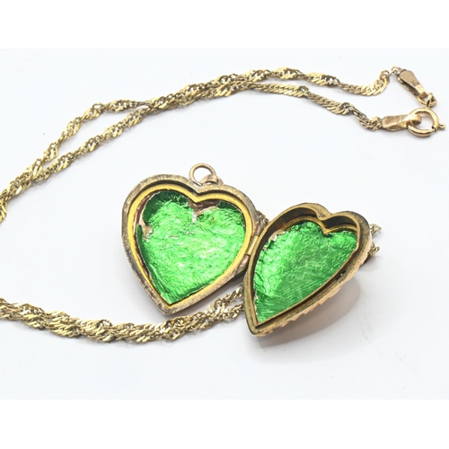 193 - 9ct gold back and front heart-shaped locket and a 9ct gold Singapore link chain, locket stamped 9CT ... 