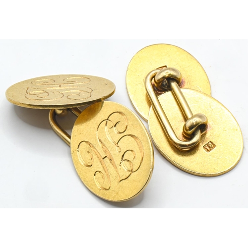 205 - Pair of 18ct gold cufflinks, each oval plaque initialled 'GH' and measuring 14 x 18mm, stamped ... 