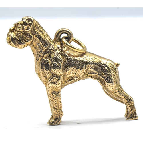 213 - 9ct gold boxer dog charm, London hallmark, 22mm high, 10.78 grams