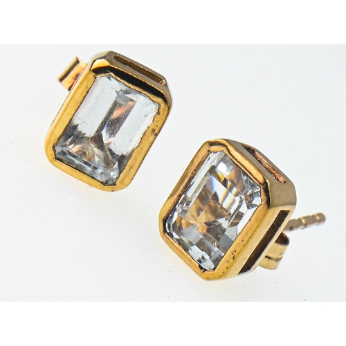 216 - Pair of 9ct gold and aquamarine ear studs, stalks with Birmingham hallmarks, butterflies stamped 375... 