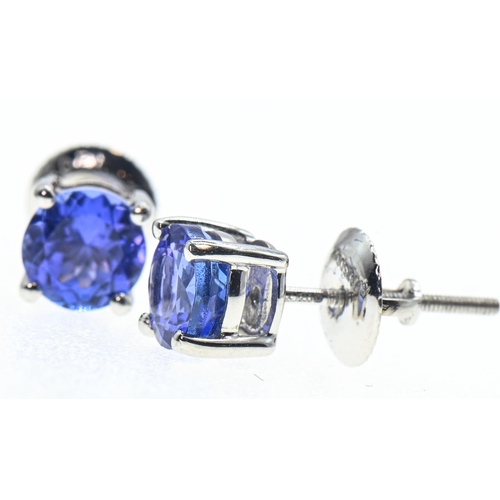 218 - Pair of platinum and tanzanite stud earrings, butterflies stamped 950Pt. and Rhapsody, gross weight ... 