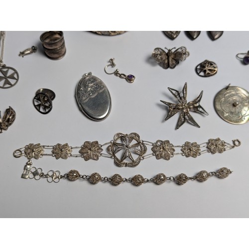 284 - Mixed silver jewellery, comprising: a hinged bracelet, Joseph Smith & Sons (Birmingham) Ltd... 