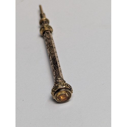 288 - Antique gilt metal jewellery and citrine topped propelling pencil, including a pinchbeck and diamond... 