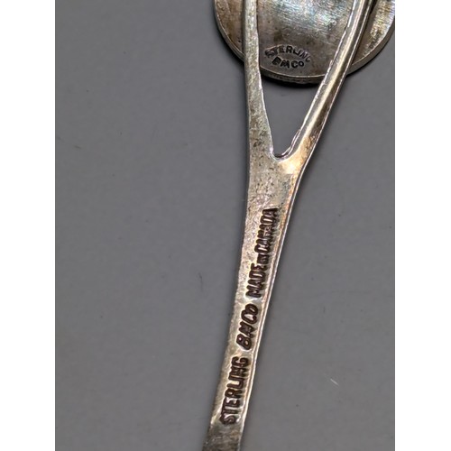 346 - Eight silver souvenir spoons, comprising: six with various British hallmarks and one Canadian sterli... 