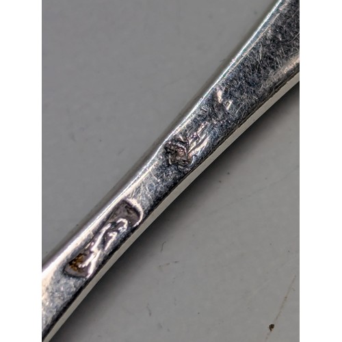 361 - Liberty & Co Ltd silver spoon, Birmingham 1930, with scroll pattern terminal, length 12.2cm... 