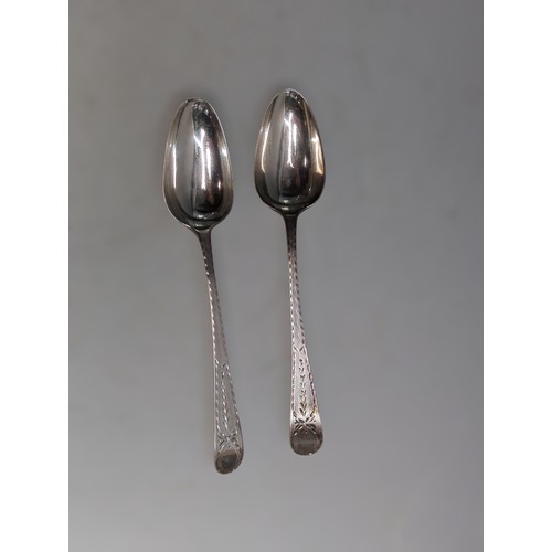 371 - Various silver spoons, comprising: George III bright-cut two dessert spoons and set of four teaspoon... 