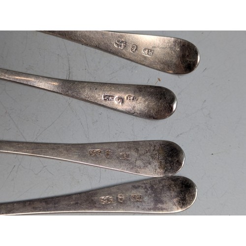 371 - Various silver spoons, comprising: George III bright-cut two dessert spoons and set of four teaspoon... 