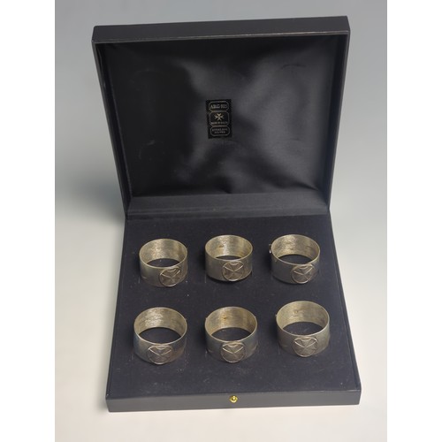 373 - Cased set of six Maltese silver napkin rings, each polished ring with an applied Maltese cross, with... 