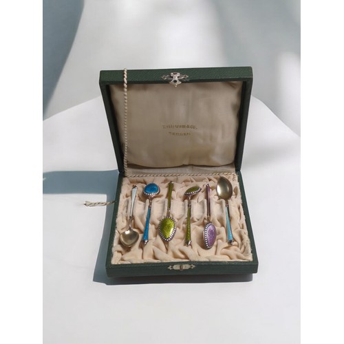 377 - Cased set of six Norwegian silver gilt and enamel demi-tasse spoons, each with six varied coloured e... 