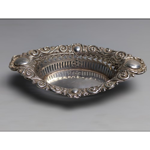 382 - Collection of silverware, various makers and dates, including: an Edwardian embossed pierced bonbon ... 