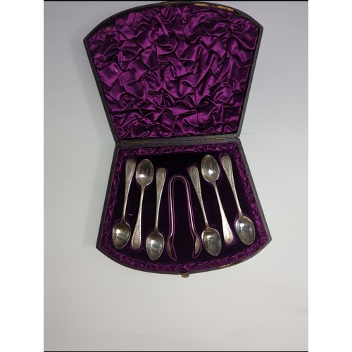 385 - Cased set of six Late Victorian silver coffee spoons and a pair of sugar nips, Sibray, Hall & Co... 