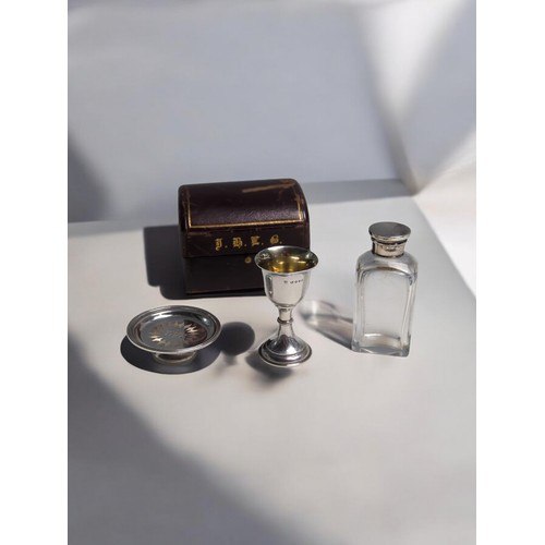 389 - Cased Late Victorian silver travelling three piece communion set, chalice and paten hallmarked Willi... 