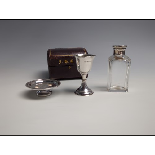 389 - Cased Late Victorian silver travelling three piece communion set, chalice and paten hallmarked Willi... 