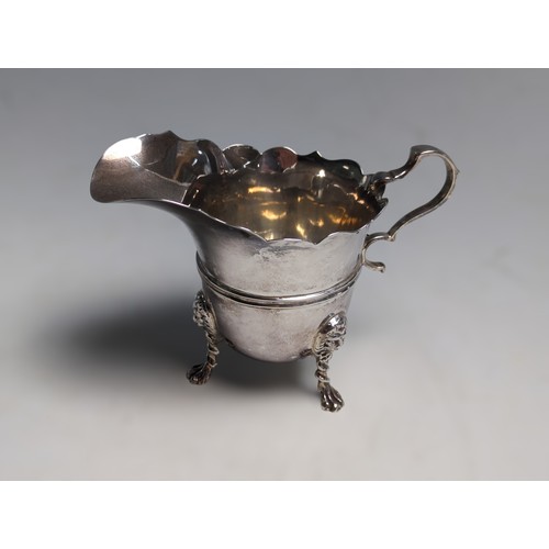 393 - Edwardian silver cream jug, Goldsmiths & Silversmiths Co Ltd, London 1902, raised on three ... 