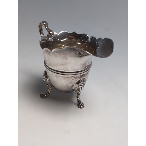 393 - Edwardian silver cream jug, Goldsmiths & Silversmiths Co Ltd, London 1902, raised on three ... 