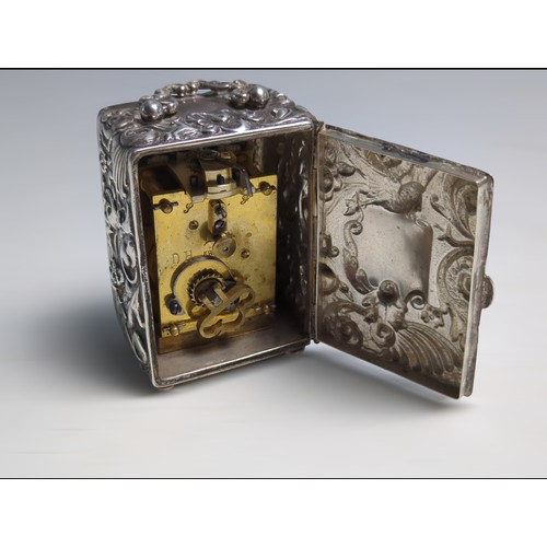 409 - Late Victorian silver cased travelling clock, Charles Henry Dumenil, London 1892, the case embo... 