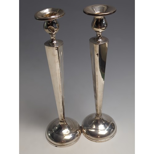 416 - Pair of silver candlesticks, marked to base 'Sterling Reinforced with Cement & Steel Rod 81... 