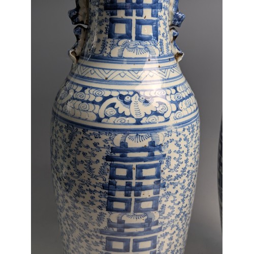 434 - A matched pair of large Chinese C19th porcelain blue and white 'Marriage' vases decorated with Doubl... 