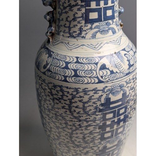 434 - A matched pair of large Chinese C19th porcelain blue and white 'Marriage' vases decorated with Doubl... 