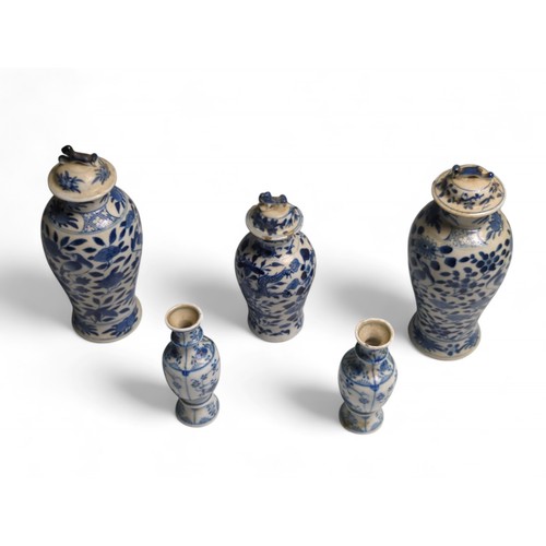 436 - Five pieces of Chinese blue and white porcelain to include a pair of lidded vases of baluster form d... 