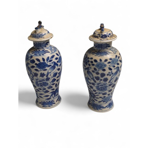 436 - Five pieces of Chinese blue and white porcelain to include a pair of lidded vases of baluster form d... 