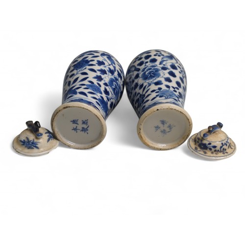 436 - Five pieces of Chinese blue and white porcelain to include a pair of lidded vases of baluster form d... 